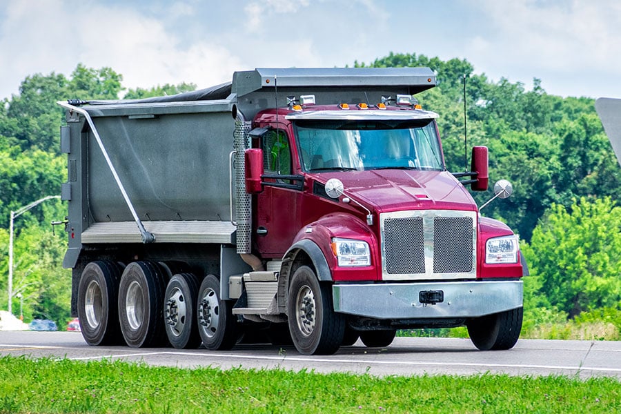 a truck is parked on the side of a road